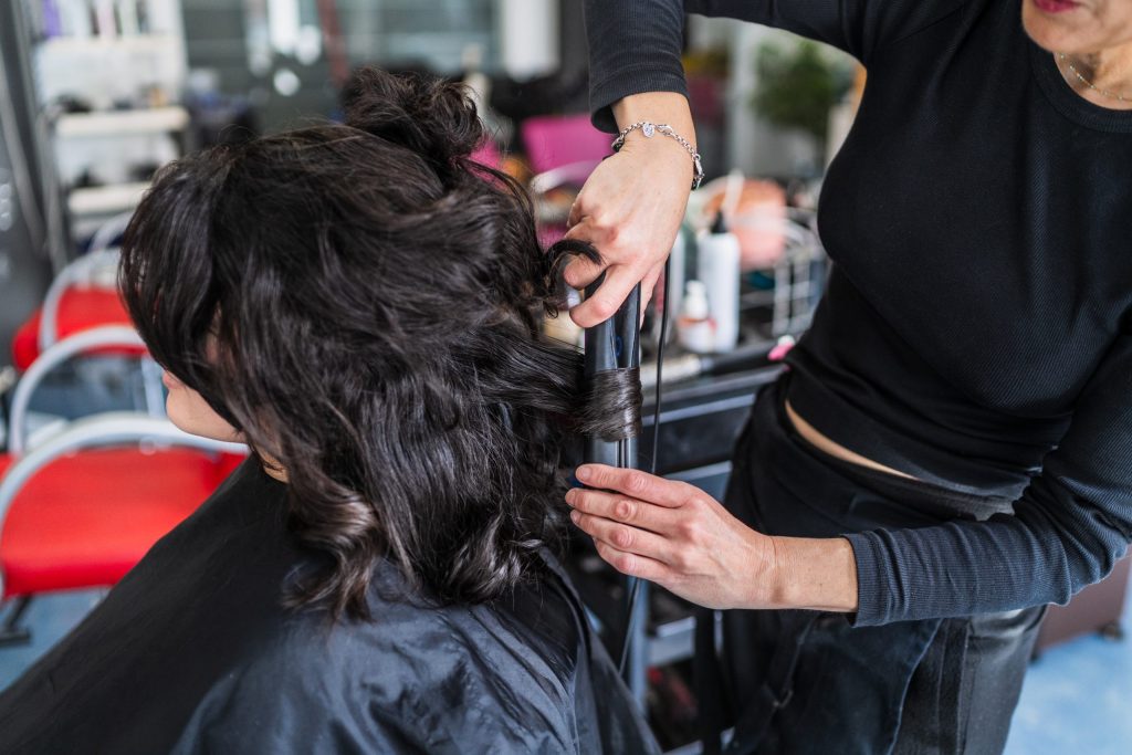 hairdresser-curling-client-s-hair-with-precision-i-2026-01-08-07-10-14-utc-scaled.jpg